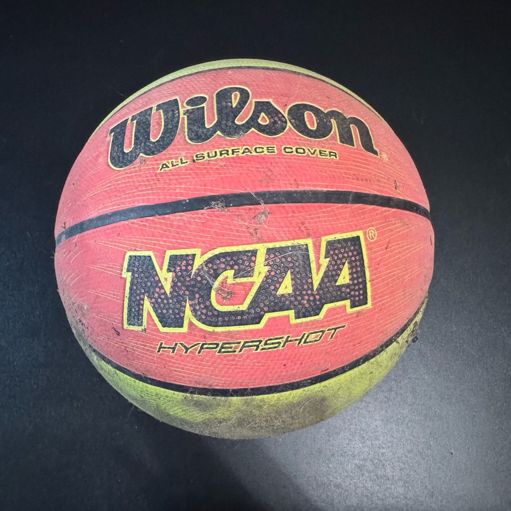 Wilson NCAA Basketball in Red and Yellow